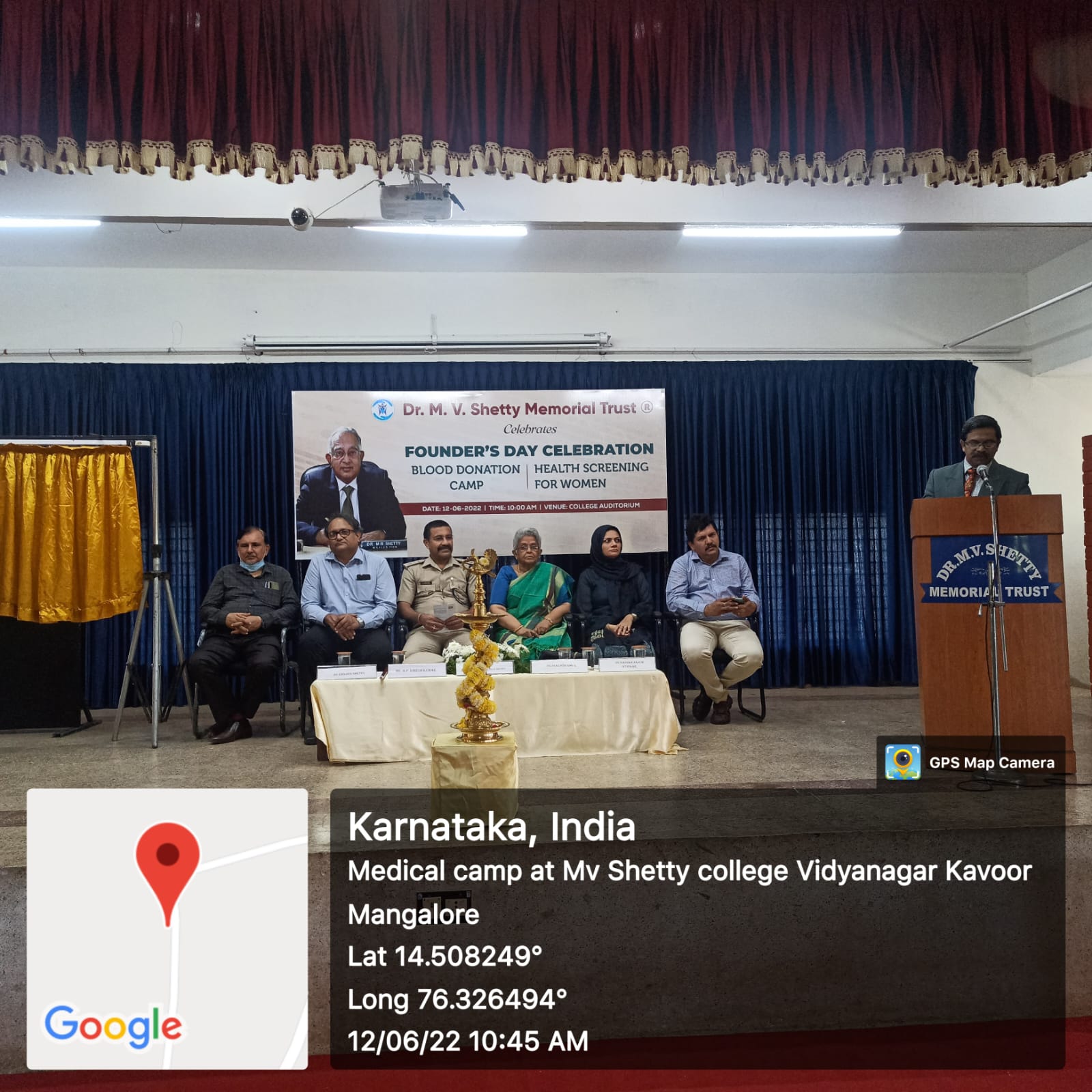 Dr. Mariam Anjum on stage at the Dr. M. V. Shetty Memorial Trust Founder's Day health screening for women